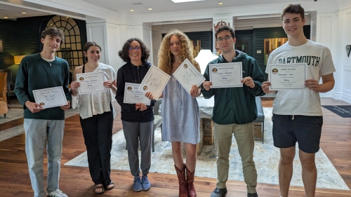 Students of Russian Accepting Certificates for Contest Participation at Hanover Inn